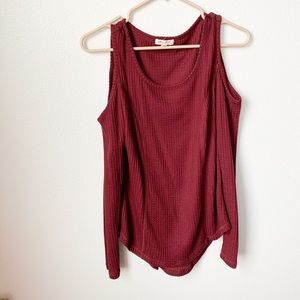 Open shoulder long sleeve.